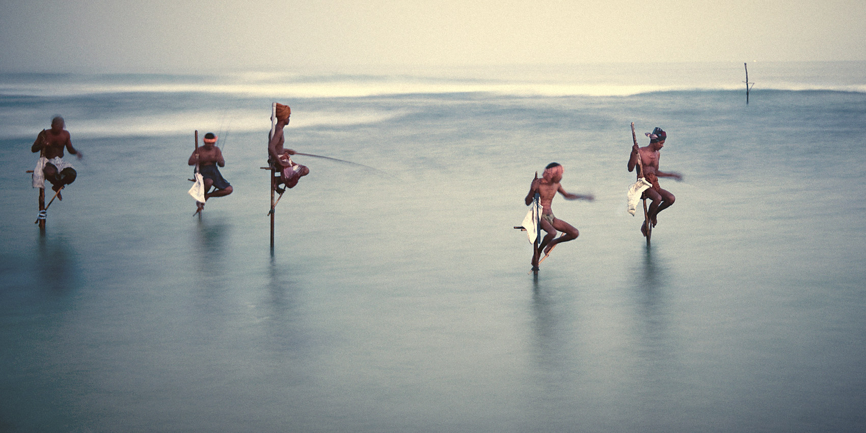 Traditional stilt fishermen at work off Sri Lanka's southern coast